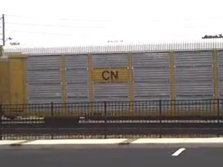 N.S. auto carrier train heading northwest through Austell Ga.
