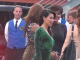 Kim Kardashian Wows in Green Dress From the Front... But Comes Undone at the Back