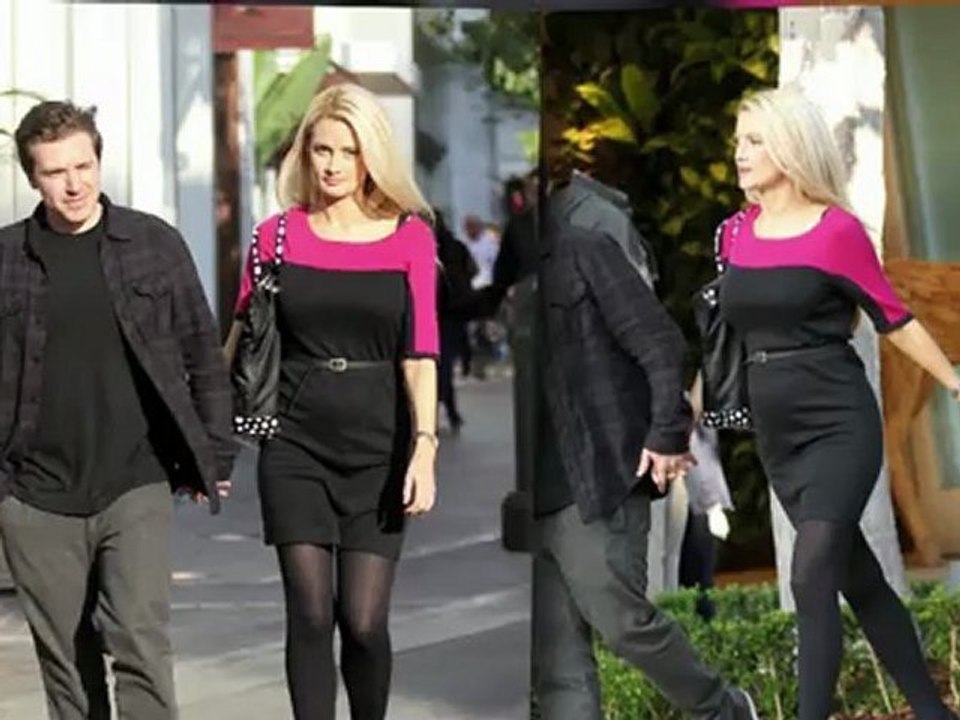 Pregnant Holly Madison Shows Off Her Growing Baby Bump in Belted Dress