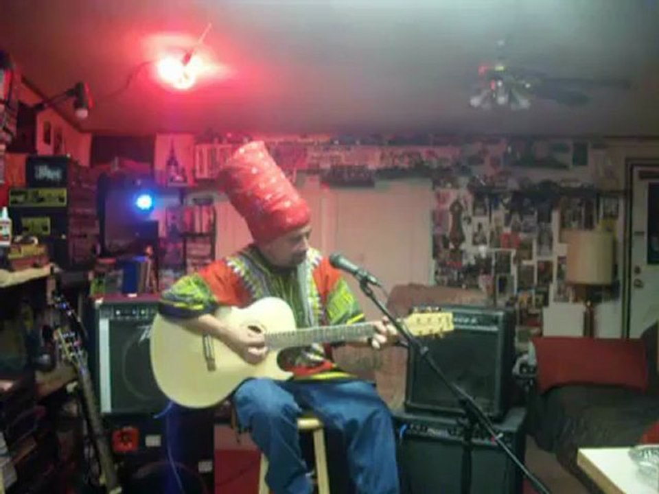 Jeff Hancock " African Standard Acoustic"  guitar, playing , playing,playing  ..