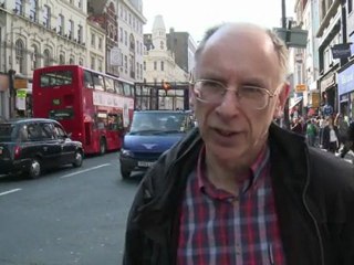 Britain budget pledges deficit action, cuts top income tax