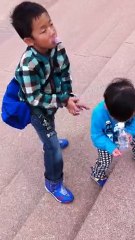 Noah climbing the Opera House steps