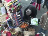 Market traders help France's poor amid soaring food prices.