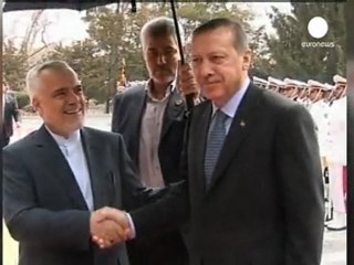 Iran welcomes Turkey's Erdogan, playing down Syria split