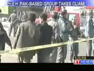 Karzai returns to Kabul after shrine attack