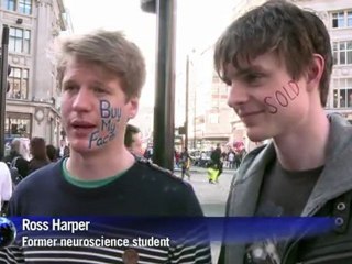 Graduates turn human billboards to pay off debts