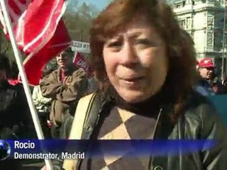 Spaniards strike over labour laws, cuts