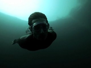 Guillaume Nery base jumping at Dean's Blue Hole!