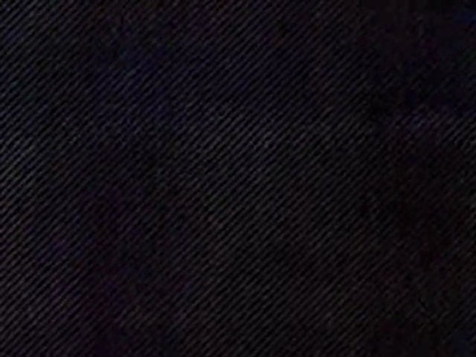 The End slate / WB/Stevens prod (Eyes of Texas tune) / odd partial text display at end