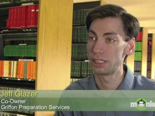 How much does the GMAT weigh in the admissions process?