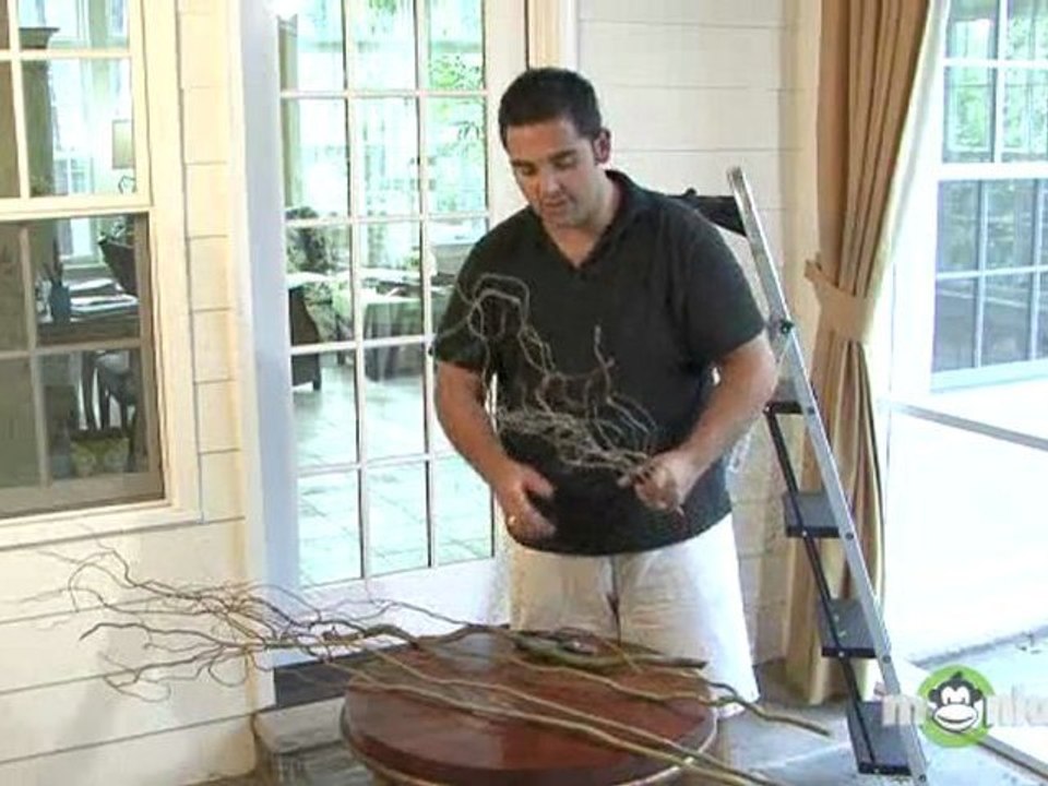Adding Curly Willow to the Grapevine Garland