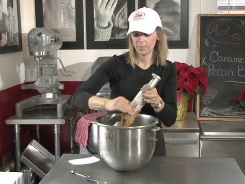 Mixing the Caramel Pecan Bar Ingredients Together