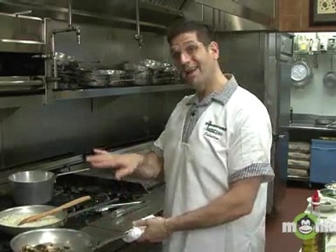 Adding Stock and Mushrooms to the Rice for Risotto
