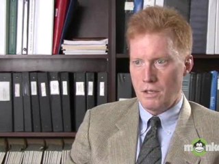 What role can a defibrillator play in treating cardiac arrest?