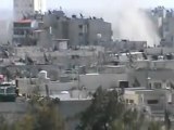 فري برس   هاام لحظة سقوط القذائف وتصاعد الدخان من المنازل حمص حي الخالدية 3 4 2012