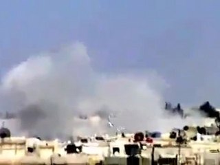 فري برس   حي دير بعلبة تصاعد الدخان الكثيف من منازل المدنيين بسبب إستمرار القصف العنيف على الحي 3 4 2012