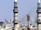 فري برس   تصاعد الدخان من حي دير بعلبة بسبب قصف الحي من قبل عصابات بشار الأسد 3 4 2012 ج1