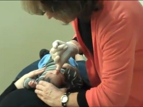 Chiropractor Adjusting an Infant - Dr Cynthia Horner