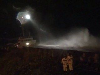 Cargo ship hits rocks off Wales coast