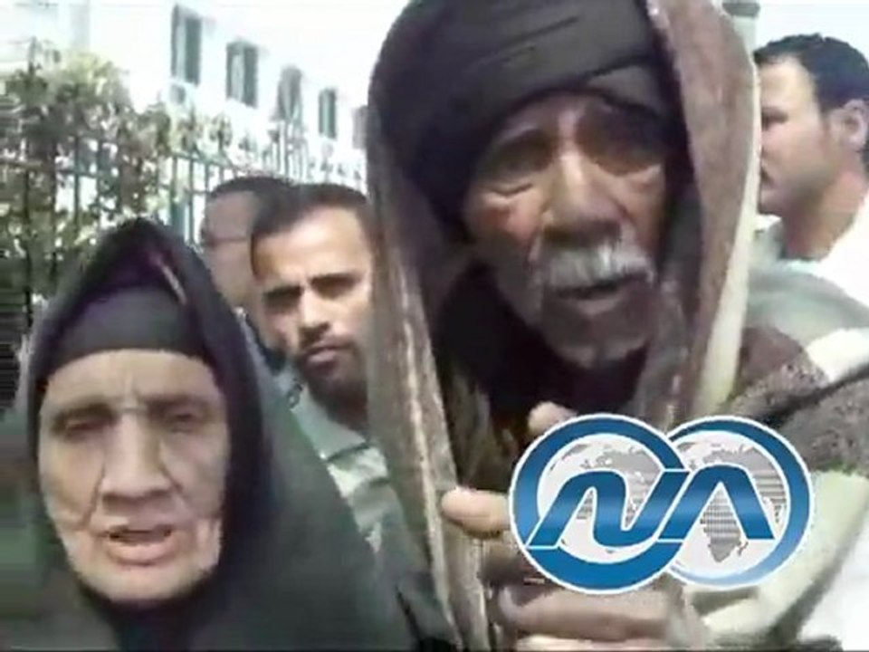 وقفه احتجاجيه امام مبني محافظة المنيا احتجاجا علي قرعه الوحدات السكنيه الاولي بالرعايه
