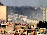 فري برس حمص لحظة سقوط  الصواريخ على المباني السكنية  وانفجارات ضخمة جدا حمص حي القرابيص وجورة الشياح 4 4 2012