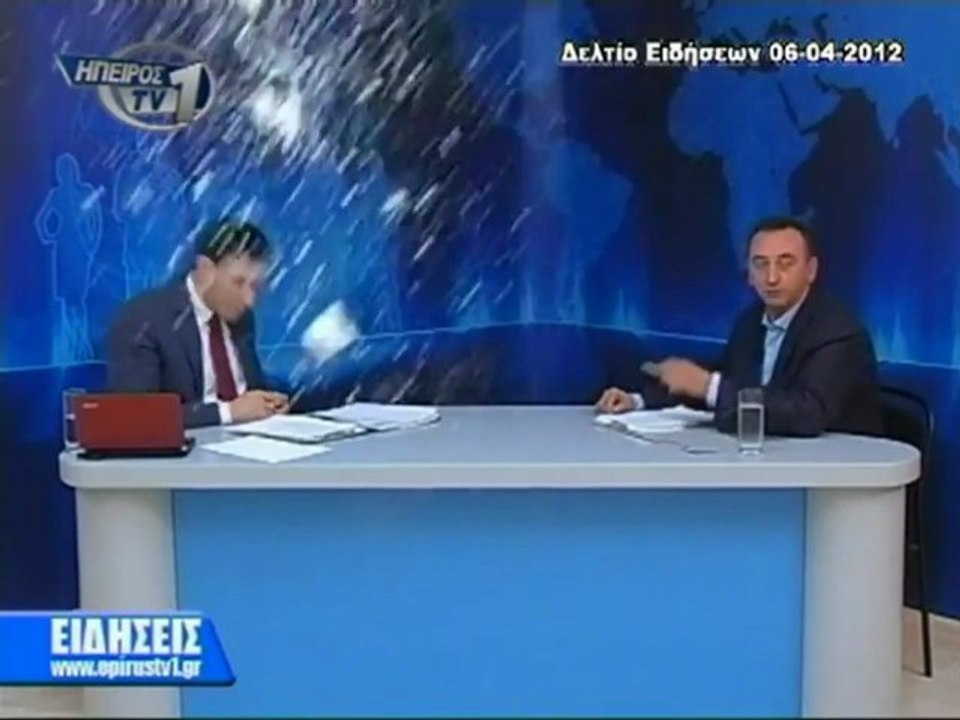 Yogurt attack during live TV News show (Greece)