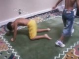 kids wrestling by Zubair Qidwai