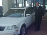 Barry Sanders Honda and Employee Aren Take A Walk Around a Gently Used Volkswagen