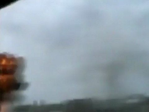 Activists say Syrian forces fire one shell a minute into Homs