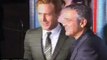 Ryan Gosling & George Clooney have a little fun at The Ides of March movie Los Angeles premiere