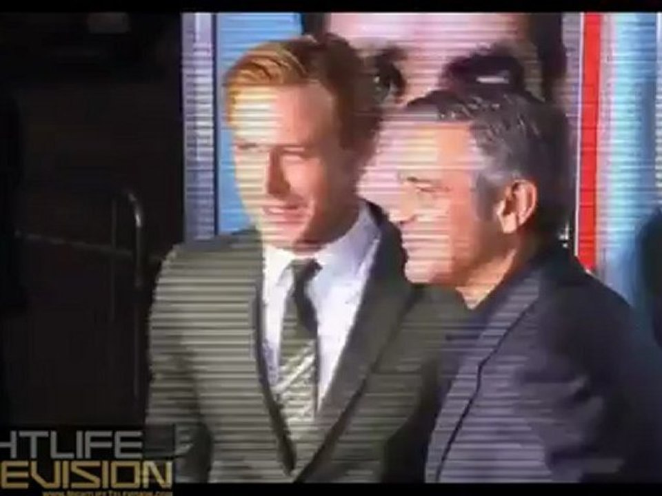 Ryan Gosling & George Clooney have a little fun at The Ides of March movie Los Angeles premiere