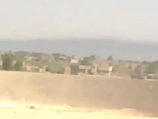 فري برس ديرالزور السنة الدخان تغطي موحسن بسبب القصف26 4 2012 DeerALzoor