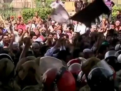 Egyptian protesters demand end of army rule.