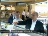 Putin and Medvedev grab a beer after May... - no comment