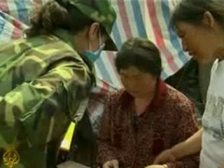 Picking up the pieces in quake-hit China - June 3 2008