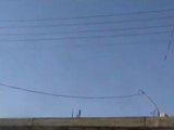 Syria - Aleppo - Andan - 20120323 - Army helicopter flying over town - part 1