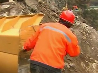 Huge blasts clear devastating Tibetan landslides