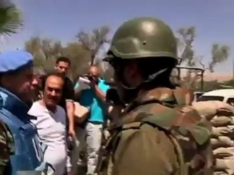 U.N. observers check Syrian tanks in unrest hotspot.