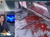 Twin car bombs kill dozens in Damascus
