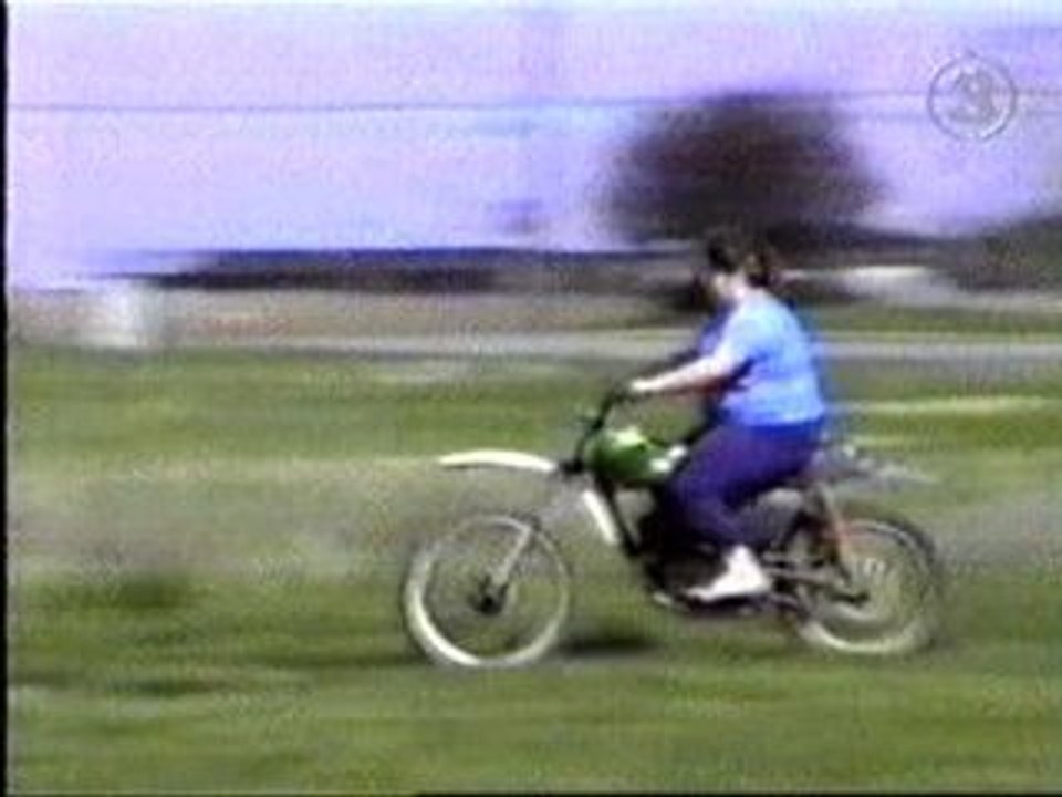 Fat woman On Dirt Bike