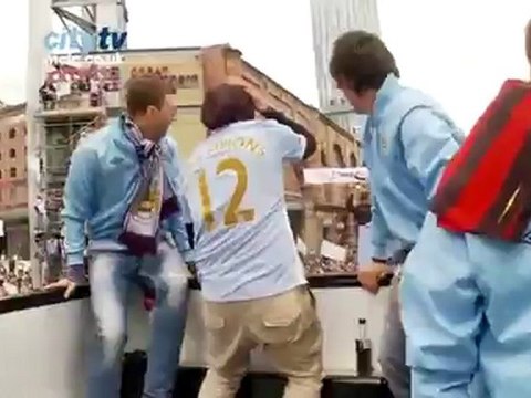 CITY CHAMPIONS Club photographer gets jumped by City players