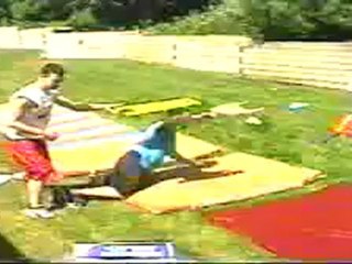 Fallen Angel throws a somersault clothesline