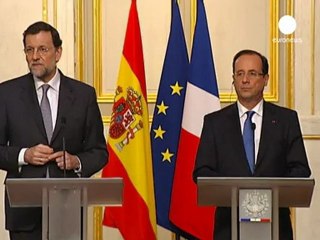 Hollande y Rajoy acercan posturas en París antes de la...
