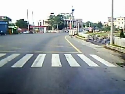 Asian Woman Parks Car