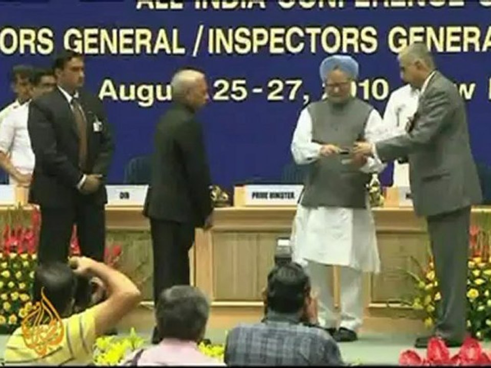 India's grain rots as poor go hungry