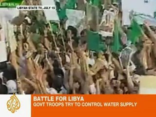 Gaddafi cuts access to oil and water