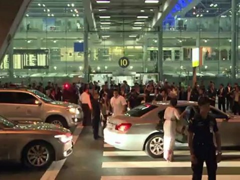 Suu Kyi in Thailand for first trip abroad in 24 years