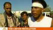 Rebels fight for Gaddafi-held neighbourhood