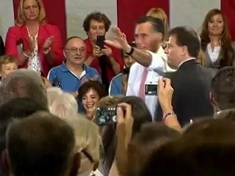 Romney reaches delegate target