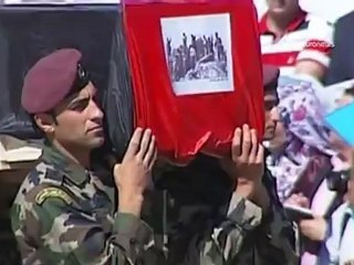 Palestinians welcome handover of militants' bodies